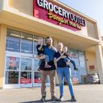 The Sundem family outside of their Grocery Outlet Bargain Market store on Tuesday, Feb. 10, 2026 in Everett, Washington. (Olivia Vanni / The Herald)