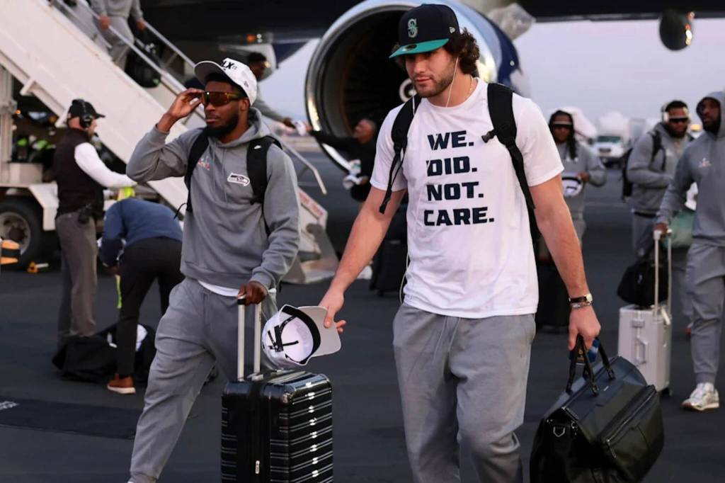Seahawks cornerback Devon Witherspoon (left) and tight end AJ Barner arrive for Super Bowl week at Jose Mineta International Airport in San Jose, California on Sunday, Feb. 1, 2026. (Photo courtesy of Kathryn Riley)