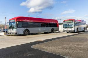 An Everett Transit bus drives away from Mall Station on Monday, Dec. 22, 2025, in Everett, Washington. (Olivia Vanni / The Herald)