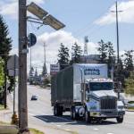 Olivia Vanni / The Herald
A truck drives west along Casino Road past a new speed camera set up near Horizon Elementary in Everett.