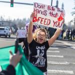 Rayna Peacher, a senior at Lakewood High School, yells as she crosses 27th Avenue Northeast during a student walkout and protest on Thursday, Feb. 5, 2026 in Marysville, Washington. (Olivia Vanni / The Herald)