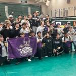 Lake Stevens boys wrestling gathers for a team photo after winning the District 1 4A Tournament at Jackson High School on Feb. 7, 2026. (Joe Pohoryles/The Herald)