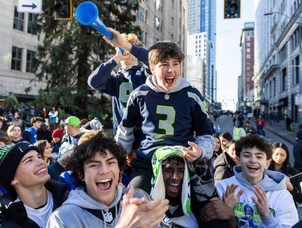 Hayden Ritchie cheers before the start of the Seahawks World Champions Parade on Wednesday, Feb. 11, 2026, in Seattle, Washington. (Olivia Vanni / The Herald)