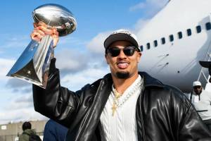Wide receiver Jaxon Smith-Njigba shows off the Lombardi Trophy on Monday, Dec. 9, 2025 after the Seattle Seahawks returned from winning Sunday's Super Bowl LX. (Photo courtesy of the Seattle Seahawks)