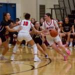 Archbishop Murphy senior Brooke Blachly utilizes a screen from junior Ashley Fletcher (10) to drive into the lane during the Wildcats' 76-18 win against the Seahawks in the District 1 2A quarterfinals at Archbishop Murphy High School on Feb. 12, 2026. (Joe Pohoryles/The Herald)