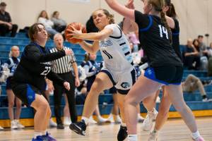 Meadowdale’s Mia Brockmeyer drives to the hoop during the game against Shorewood on Wednesday, Jan. 22, 2025 in Lynnwood, Washington. (Olivia Vanni / The Herald)