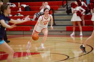 Snohomish senior Siena Capelli charges up the court during the Panthers' 47-36 win against Meadowdale in the District 1 3A semifinals at Snohomish High School on Feb. 18, 2026. (Joe Pohoryles/The Herald)