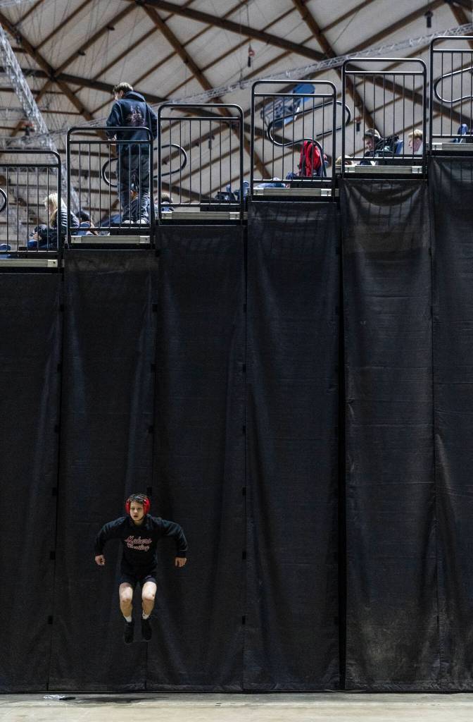 A wrestlers warms up before their match at the Mat Classic on Friday, Feb. 20, 2026 in Tacoma, Washington. (Olivia Vanni / The Herald)