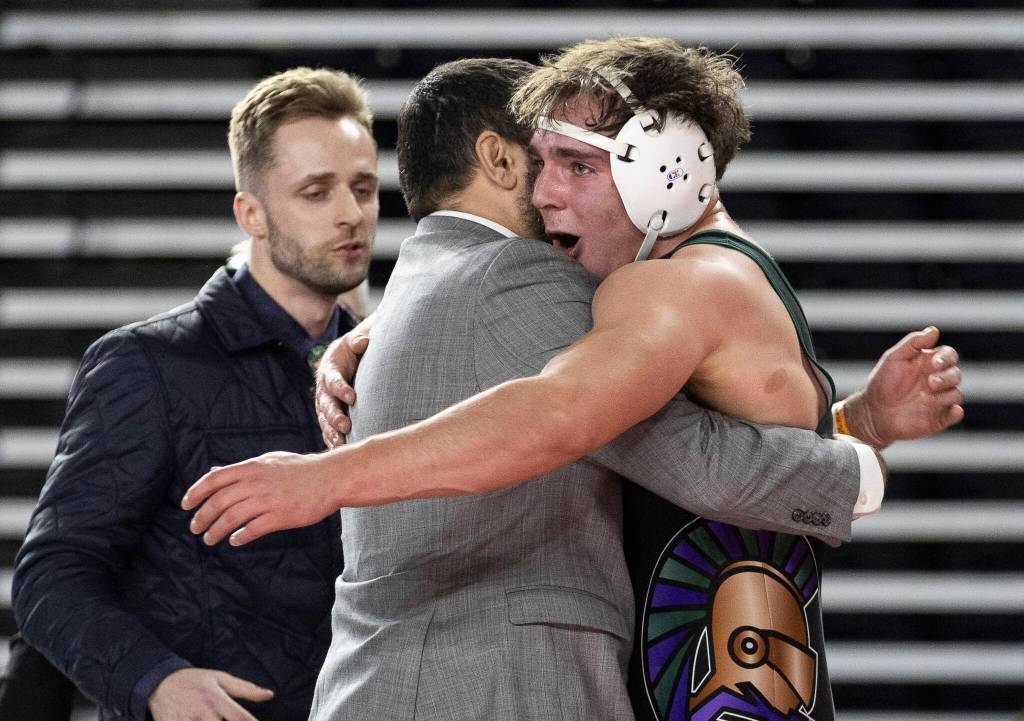 Edmonds-Woodways Carmelo Larocca reacts after winning the 3A boys 190-pound championship match at the Mat Classic on Friday, Feb. 20, 2026 in Tacoma, Washington. (Olivia Vanni / The Herald)