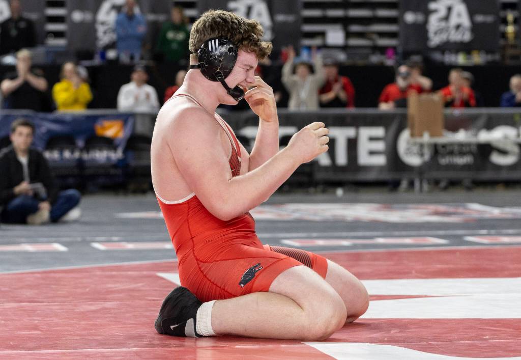 Snohomishs Odin Schwabenbauer reacts after wining the 3A boys 285-pound championship match at the Mat Classic on Friday, Feb. 20, 2026 in Tacoma, Washington. (Olivia Vanni / The Herald)