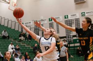 Meadowdale's Lexi Zardis goes for a layup against Shorecrest during a district basketball game on Saturday, Feb. 21, 2026 at Jackson H.S. in Mill Creek. (Qasim Ali / The Herald)