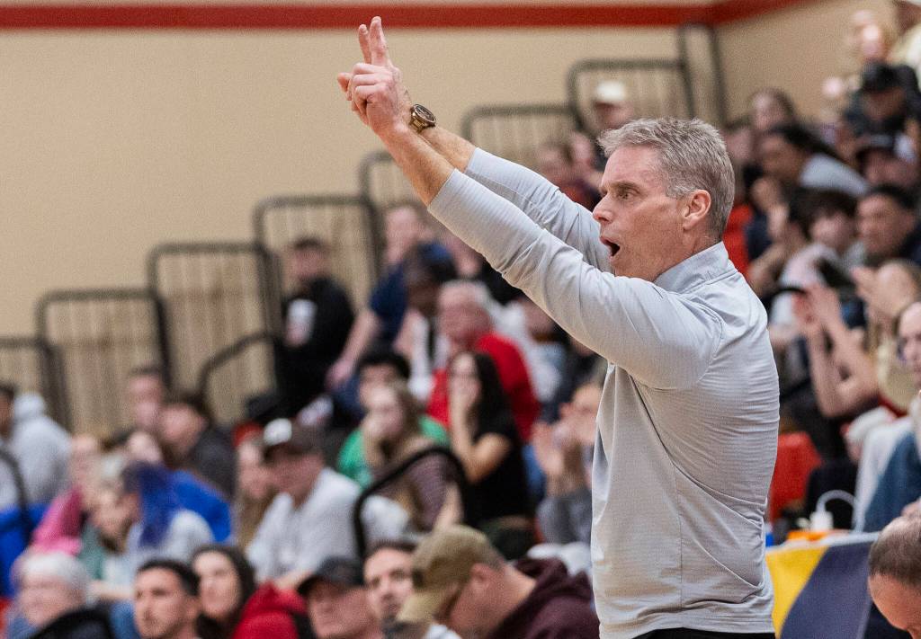Snohomish head coach Jeff Larson calls out a play during the 3A state opening round loser-out game against Mountain View on Tuesday, Feb. 24, 2026 in Snohomish, Washington. (Olivia Vanni / The Herald)