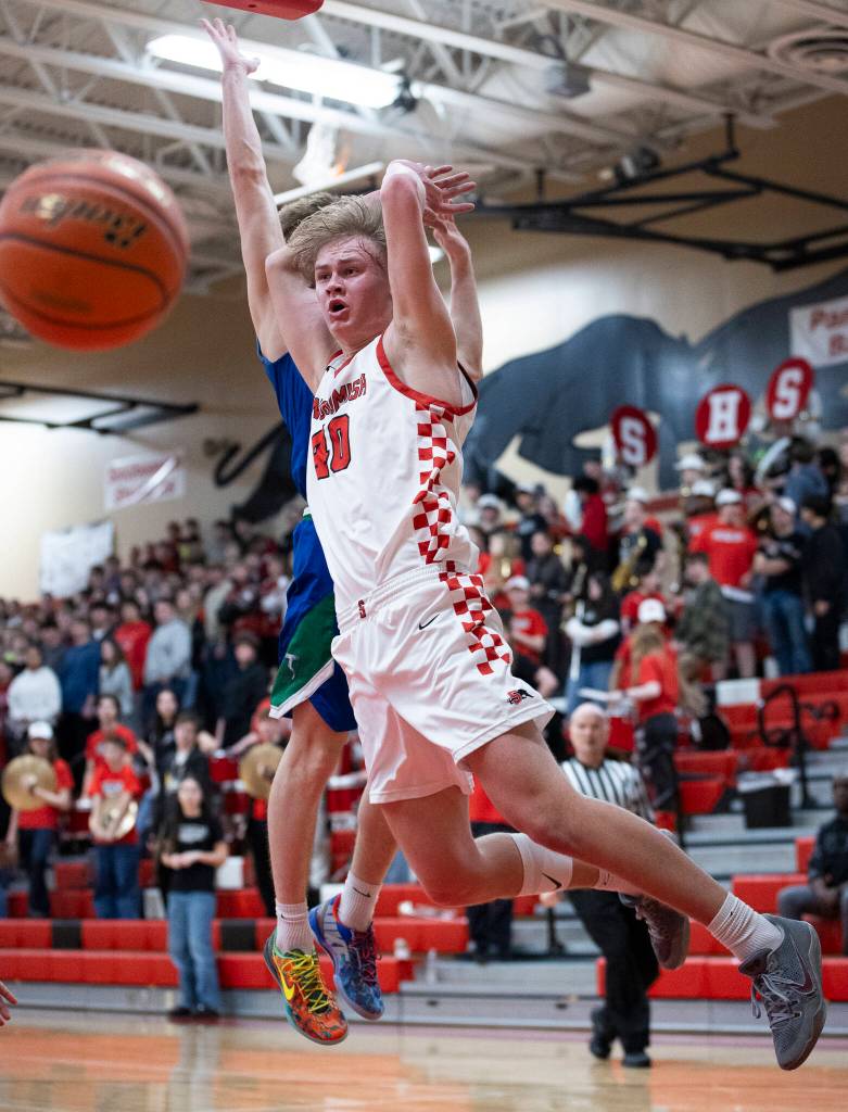 Snohomishs Hudson Smith looks to the referee for a foul call during the 3A state opening round loser-out game against Mountain View on Tuesday, Feb. 24, 2026 in Snohomish, Washington. (Olivia Vanni / The Herald)