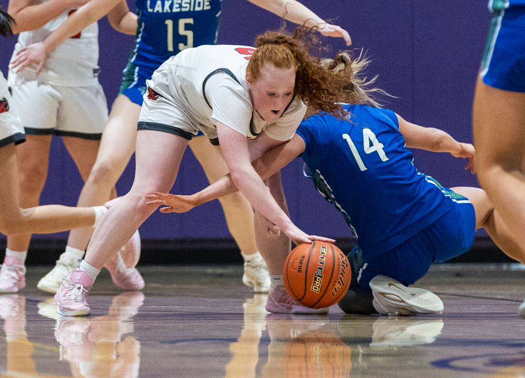 Kings Eleanor Gaydos scrambles for a loose ball during the 2A state opening round game against Lakeside on Friday, Feb. 27, 2026 in Bothell, Washington. (Olivia Vanni / The Herald)