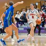 Kings Kaitlin Cramer takes the ball up the court during the 2A state opening round game against Lakeside on Friday, Feb. 27, 2026 in Bothell, Washington. (Olivia Vanni / The Herald)