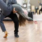 Dance instructor Antonio Samayo dips student Alexis Bartsch during her lesson at the Arthur Murray Dance Center on Tuesday, Jan. 13, 2026 in Everett, Washington. (Olivia Vanni / The Herald)