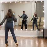 Dance instructor Antonio Samayo and student Alexis Bartsch look in the mirror while they work through a dance at the Arthur Murray Dance Center on Tuesday, Jan. 13, 2026 in Everett, Washington. (Olivia Vanni / The Herald)