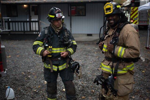 Everett Fire Captain D.J. Neyens works with a recruit at the Snohomish County Fire Training Academy. (Photo courtesy of D.J. Neyens)
