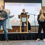 Steve Hoard, left, and Sarah Cho, right, participate in a trivia game during the State of the City event at the Lynnwood Neighborhood Center on Thursday, March 26, 2026 in Lynnwood, Washington. (Olivia Vanni / The Herald)