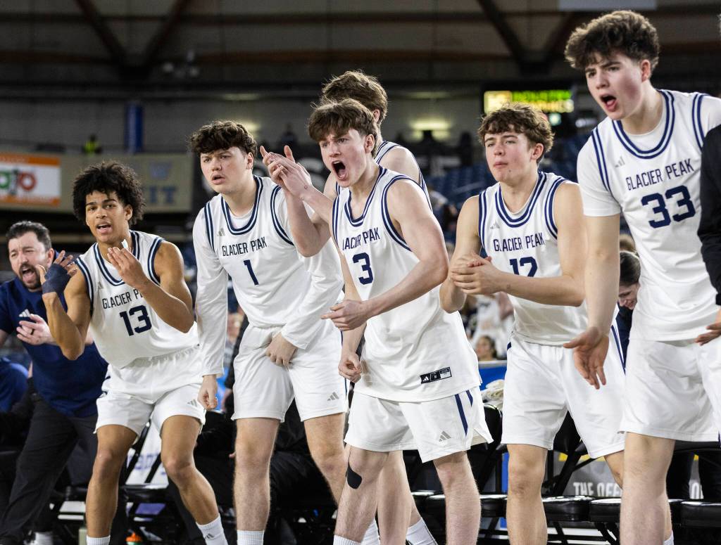 The Glacier Peak bench reacts to a score during the 4A state game against Woodinville on Wednesday, March 4, 2026 in Tacoma, Washington. (Olivia Vanni / The Herald)