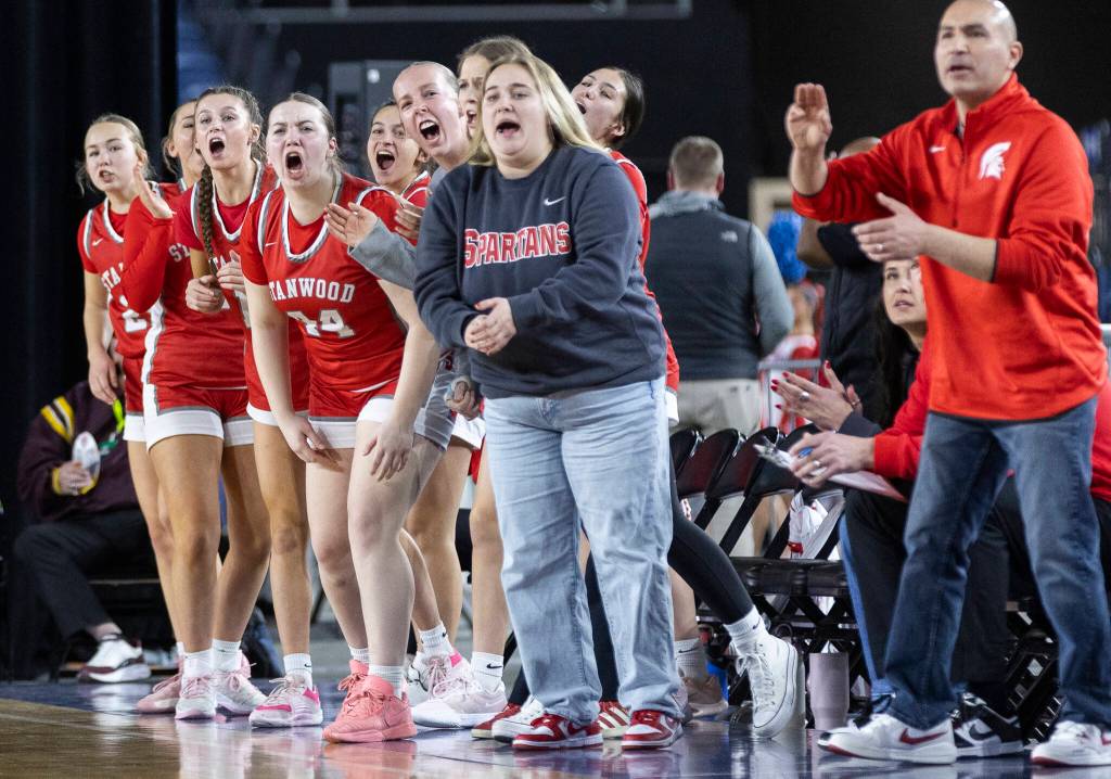 The Stanwood bench reacts to a score during the 3A state game against Edmonds-Woodway on Wednesday, March 4, 2026 in Tacoma, Washington. (Olivia Vanni / The Herald)