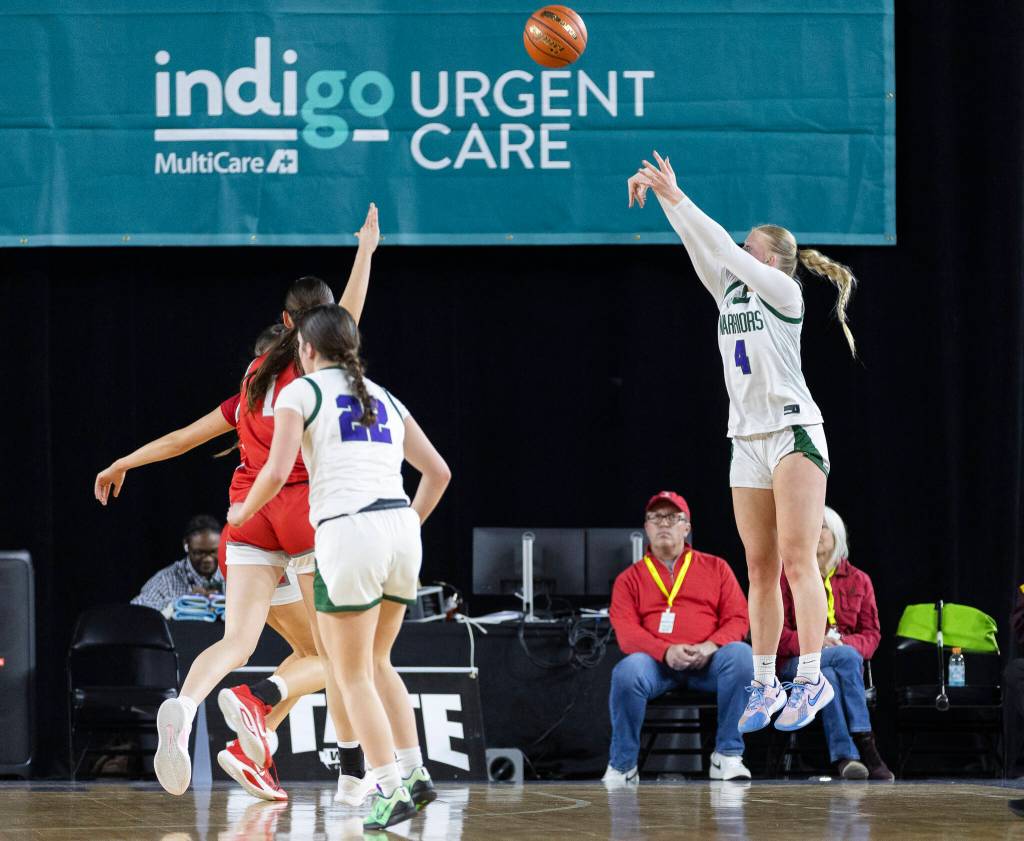 Edmonds-Woodways Finley Wichers takes a three-point shot during the 3A state game against Stanwood on Wednesday, March 4, 2026 in Tacoma, Washington. (Olivia Vanni / The Herald)
