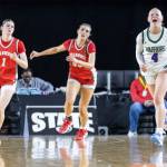 Edmonds-Woodways Finley Wichers reacts after hitting a three-point shot during the 3A state game against Stanwood on Wednesday, March 4, 2026 in Tacoma, Washington. (Olivia Vanni / The Herald)