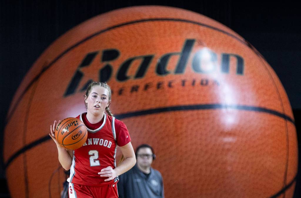 Stanwoods Ellalee Wortham takes the ball up the court during the 3A state game against Edmonds-Woodway on Wednesday, March 4, 2026 in Tacoma, Washington. (Olivia Vanni / The Herald)
