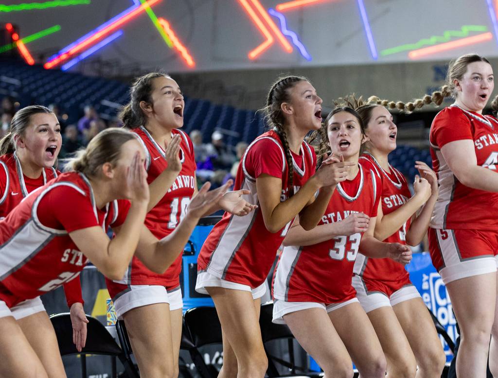The Stanwood bench reacts to a score during the 3A state game against Edmonds-Woodway on Wednesday, March 4, 2026 in Tacoma, Washington. (Olivia Vanni / The Herald)