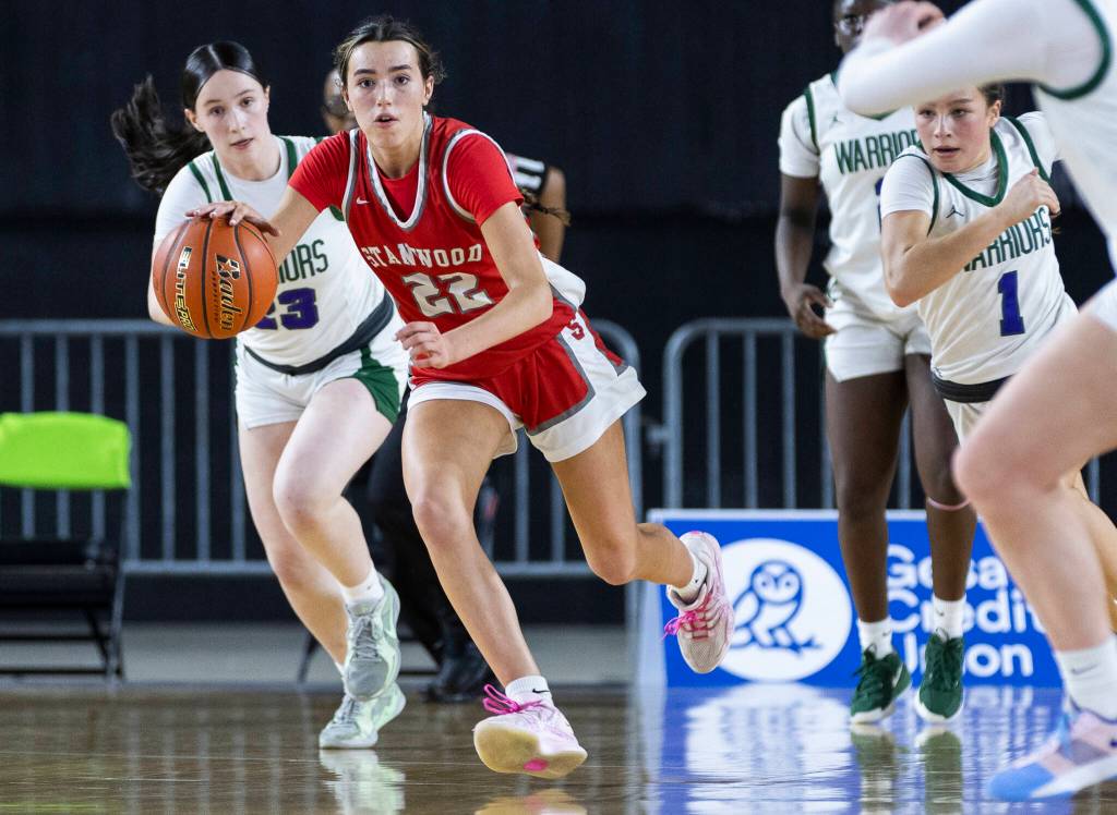 Stanwoods Georgia Lenz takes the ball up the court during the 3A state game against Edmonds-Woodway on Wednesday, March 4, 2026 in Tacoma, Washington. (Olivia Vanni / The Herald)