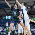 Edmonds-Woodways William Alseth lays up the ball during the 3A state quarterfinal game Bellarmine Prep on Thursday, March 5, 2026 in Tacoma, Washington. (Olivia Vanni / The Herald)