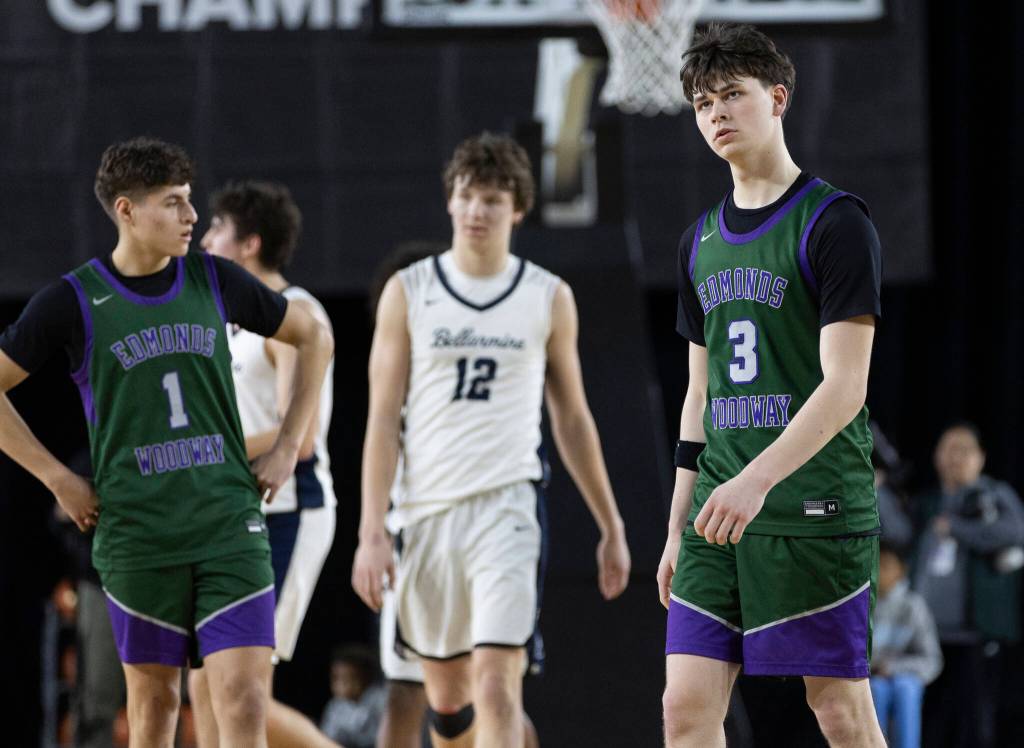 Edmonds-Woodway’s Grant Williams walks off the court after losing to Bellarmine Prep in the 3A state quarterfinal game on Thursday, March 5, 2026 in Tacoma, Washington. (Olivia Vanni / The Herald)