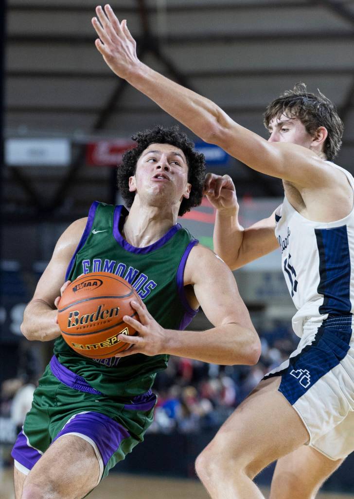 Edmonds-Woodways Julian Gray looks to shoot the ball during the 3A state quarterfinal game Bellarmine Prep on Thursday, March 5, 2026 in Tacoma, Washington. (Olivia Vanni / The Herald)