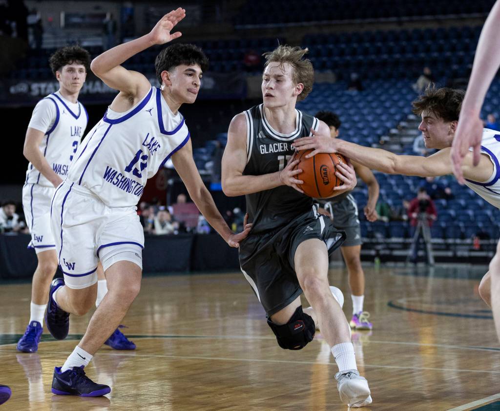 Glacier Peaks Reed Nagel drives to the hoop during the 4A state quarterfinal game against Lake Washington on Thursday, March 5, 2026 in Tacoma, Washington. (Olivia Vanni / The Herald)