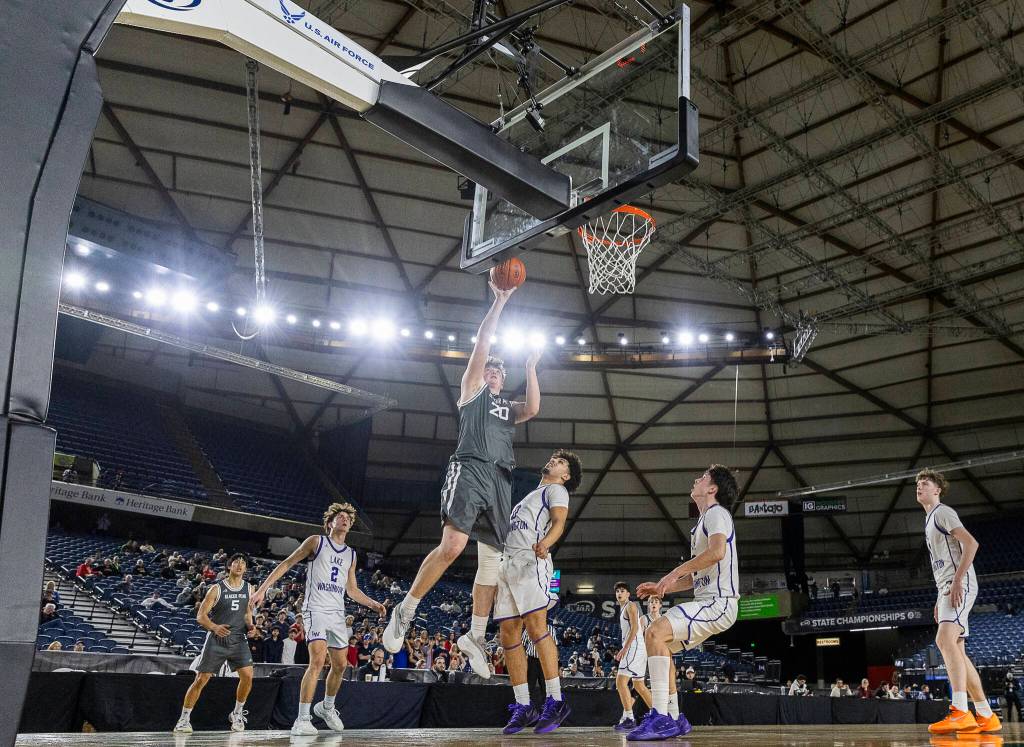 Glacier Peaks Zachary Albright shoots a layup during the 4A state quarterfinal game against Lake Washington on Thursday, March 5, 2026 in Tacoma, Washington. (Olivia Vanni / The Herald)