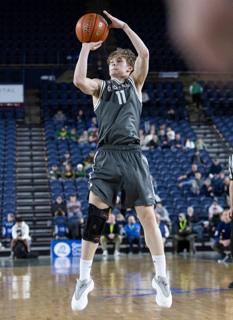 Glacier Peaks Reed Nagel takes a three-point shot during the 4A state quarterfinal game against Lake Washington on Thursday, March 5, 2026 in Tacoma, Washington. (Olivia Vanni / The Herald)