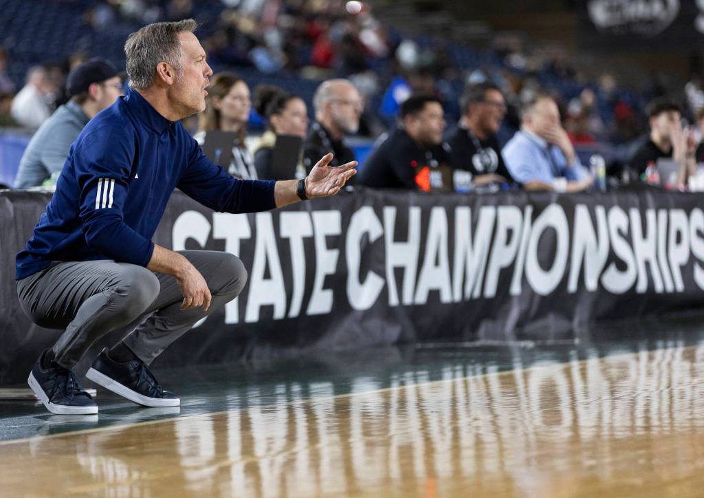 Glacier Peak head coach Brian Hunter calls out a play during the 4A state quarterfinal game against Lake Washington on Thursday, March 5, 2026 in Tacoma, Washington. (Olivia Vanni / The Herald)