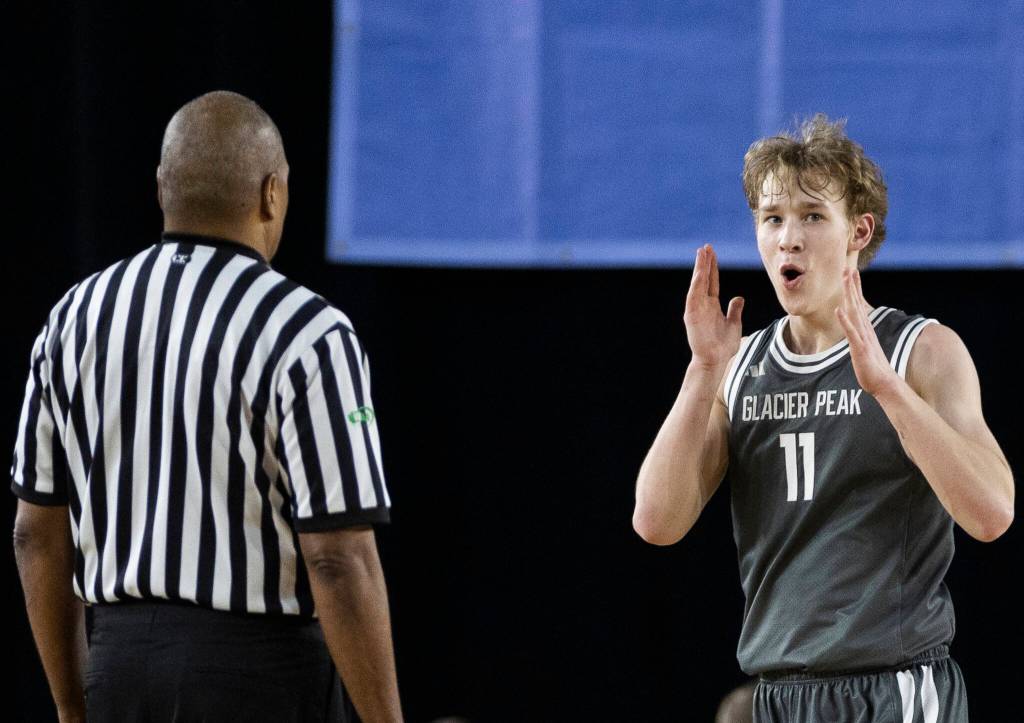 Glacier Peaks Reed Nagel reacts to a foul call during the 4A state quarterfinal game against Lake Washington on Thursday, March 5, 2026 in Tacoma, Washington. (Olivia Vanni / The Herald)