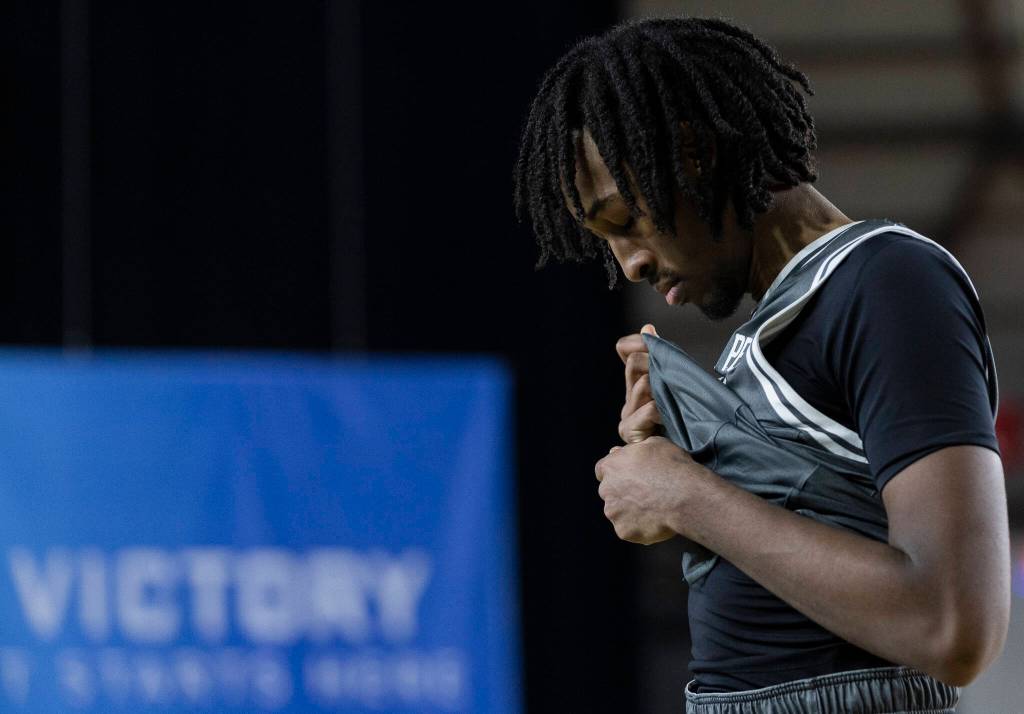 Glacier Peaks Paulos Mulugeta looks on after losing in the 4A state quarterfinal game against Lake Washington on Thursday, March 5, 2026 in Tacoma, Washington. (Olivia Vanni / The Herald)