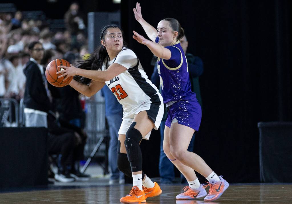 Lake Stevens Tessa Anastasi defends during the 4A state quarterfinal game against Davis on Thursday, March 5, 2026 in Tacoma, Washington. (Olivia Vanni / The Herald)