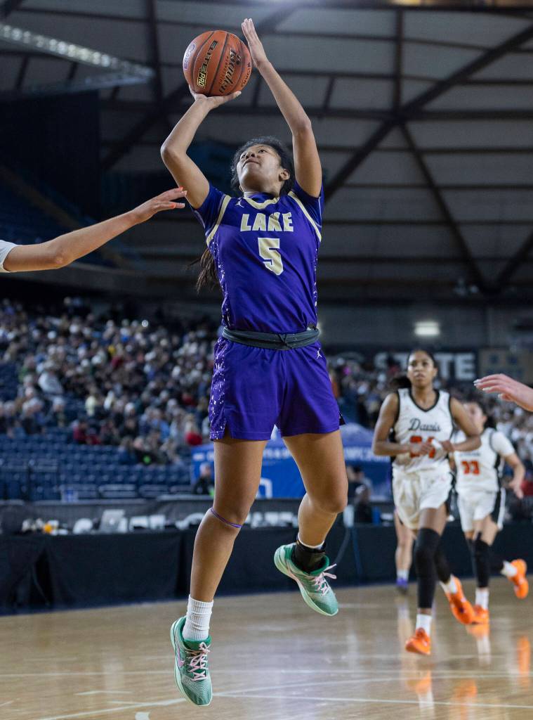 Lake Stevens Noelani Tupua takes a jump shot during the 4A state quarterfinal game against Davis on Thursday, March 5, 2026 in Tacoma, Washington. (Olivia Vanni / The Herald)