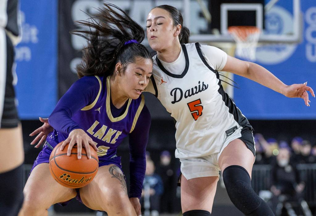 Lake Stevens Keira Isabelle Tupua drives to the hoop during the 4A state quarterfinal game against Davis on Thursday, March 5, 2026 in Tacoma, Washington. (Olivia Vanni / The Herald)