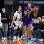 Lake Stevens Noelani Tupua takes the ball up the court during the 4A state quarterfinal game against Davis on Thursday, March 5, 2026 in Tacoma, Washington. (Olivia Vanni / The Herald)