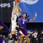 Lake Stevens Noelani Tupua blocks a shot during the 4A state quarterfinal game against Davis on Thursday, March 5, 2026 in Tacoma, Washington. (Olivia Vanni / The Herald)