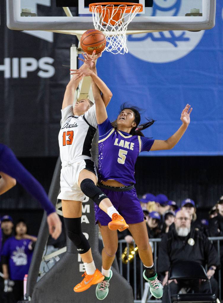 Lake Stevens Noelani Tupua blocks a shot during the 4A state quarterfinal game against Davis on Thursday, March 5, 2026 in Tacoma, Washington. (Olivia Vanni / The Herald)