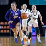 Lake Stevens Keira Isabelle Tupua takes the ball up the court during the 4A state quarterfinal game against Davis on Thursday, March 5, 2026 in Tacoma, Washington. (Olivia Vanni / The Herald)