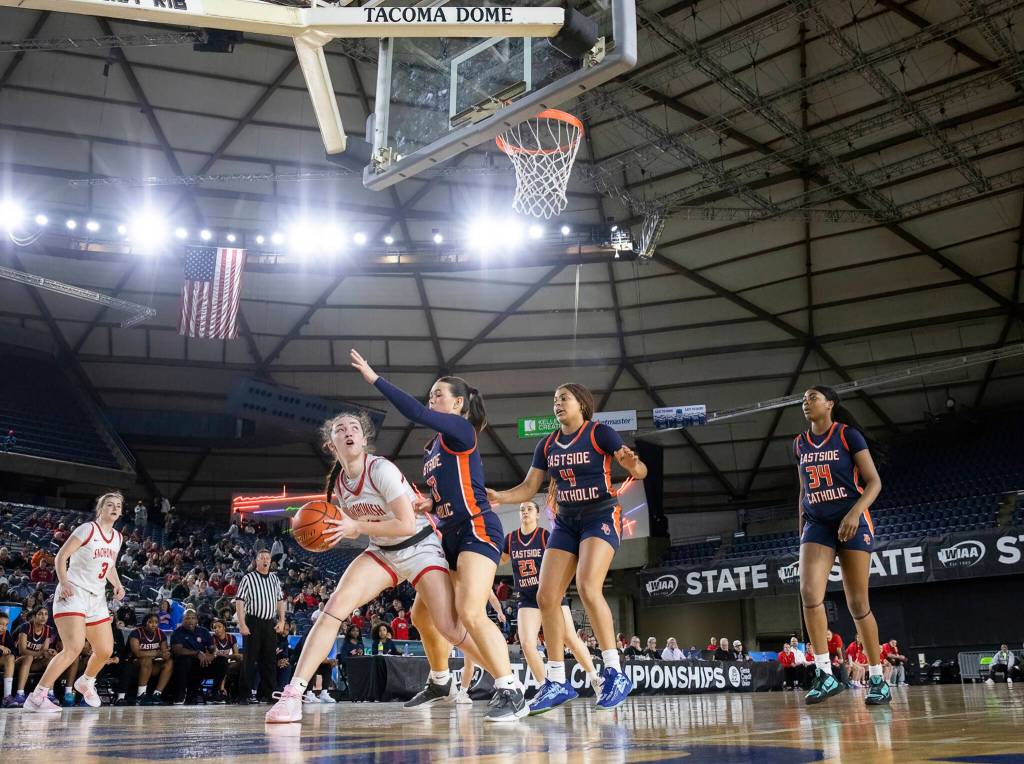 Snohomishs Sienna Capelli looks to shoot the ball while Eastside Catholics Talia Cermak defends during 3A state semifinal game on Friday, March 6, 2026 in Tacoma, Washington. (Olivia Vanni / The Herald)