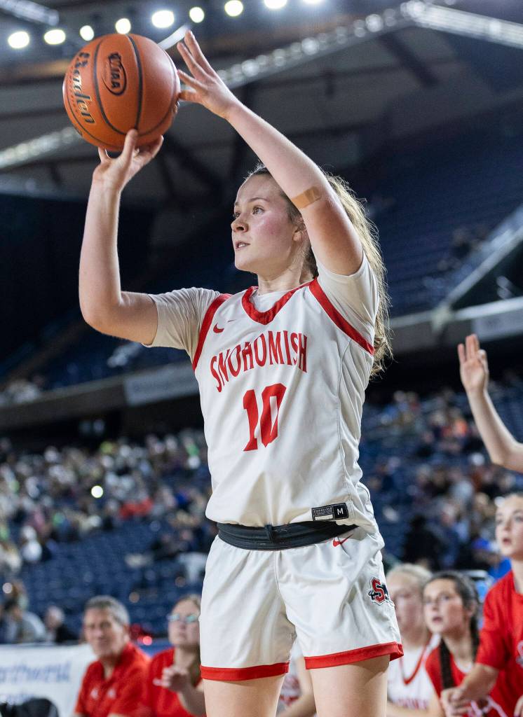 Snohomishs Lizzie Allyn takes a three-point shot during 3A state semifinal game against Eastside Catholic on Friday, March 6, 2026 in Tacoma, Washington. (Olivia Vanni / The Herald)