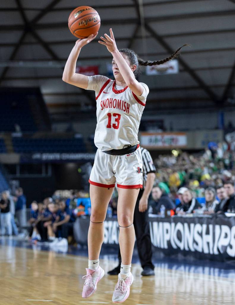 Snohomishs Sienna Capelli takes a three-point shot during 3A state semifinal game against Eastside Catholic on Friday, March 6, 2026 in Tacoma, Washington. (Olivia Vanni / The Herald)