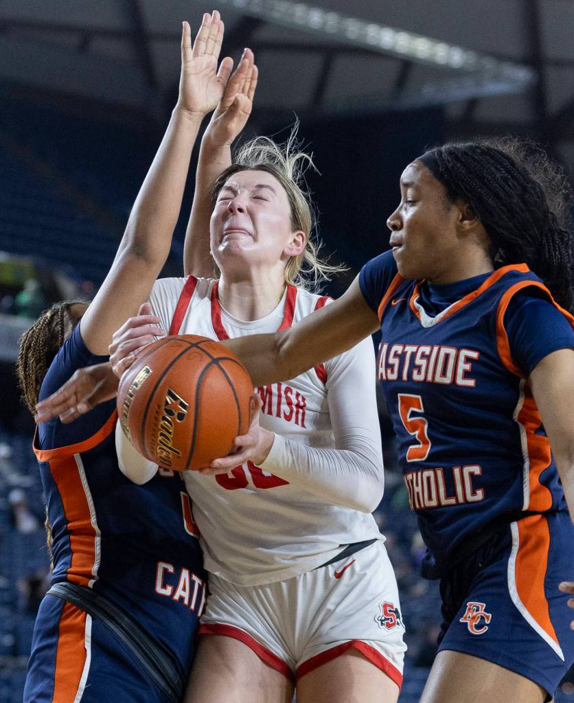Snohomishs Lola Rotondo is fouled while trying to shoot during 3A state semifinal game against Eastside Catholic on Friday, March 6, 2026 in Tacoma, Washington. (Olivia Vanni / The Herald)